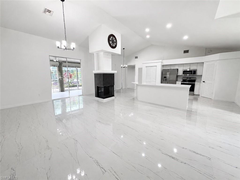 Enjoy the Naples lifestyle in this spacious 3-bedroom, 2-bath single-family home located in the desirable Plantation community. Situated on a large corner lot with beautiful lake views, this home offers over 2,000 square feet of living space, a 2-car garage, and a bright open floor plan with volume ceilings throughout. The oversized primary suite features generous closet space and an en-suite bathroom with dual vanities. Additional highlights include a large screened lanai, private pool, spacious laundry room, and abundant natural light. Conveniently located near shopping, dining, schools, and just a short drive to Naples beaches. Lawn and pool maintenance included. Available for annual rental.