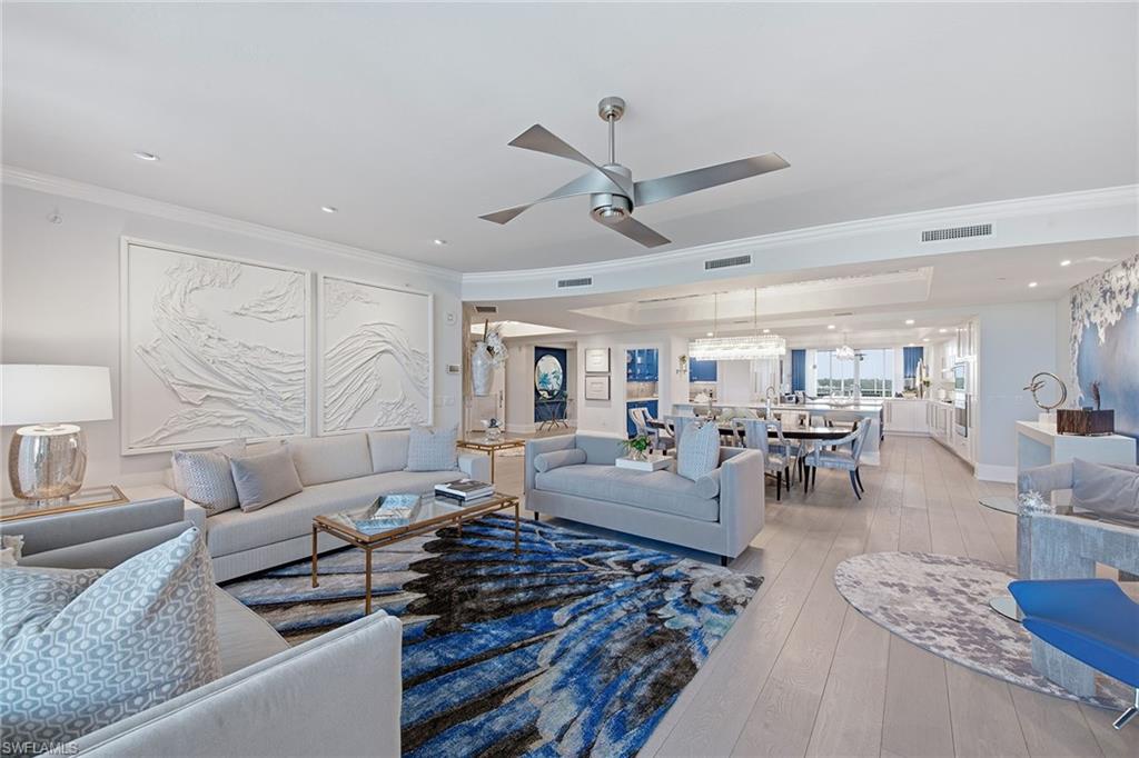Almost $300,000 worth of upgrades in this exceptional 6th floor residence in AQUA. Perfectly positioned with incredible views of the Gulf and Aqua’s own private marina making this home perfect for boaters or lovers of boats. Enter from your own private elevator to this 3,940 sf, 3 bedroom, 3.5 bath residence. This home is exquisitely appointed with exceptional unique features throughout.  Warm woods, and cool stone provide a great backdrop for splashes of color. Only the finest in finishes and selections make this an exquisite & timeless elegant one-of-a kind home. There are two separate living areas providing ample space for relaxation and entertaining possibilities.  The main great room flows seamlessly to the covered 650 sf of outdoor space with a built-in gas grill, perfect for evenings sipping on a chilled glass of wine while watching the sunset or mornings enjoying your coffee taking in serene coastal scenes and wildlife. The open concept main floor plan connects you to the gourmet kitchen featuring Wolf and Sub-Zero appliances, Cristallo kitchen counter tops, a wine closet, large island, two dishwashers and separate prep/bar area with an ice maker.  Truly, a chef’s dream come true!  The luxurious owner’s suite with spectacular water views, is complemented by a spa-inspired bath and two generous walk-in-closets. Two en-suite guest bedrooms allow your guest or family members privacy and comfort where the views of the Kinsale Golf course are both breathtaking and serene.  Aqua is a low density, boutique building with bridge free access to the Gulf in five minutes. Enjoy kayaking, grills, fire pits, game room with virtual golf, two dog runs, putting green, movie theater, fitness center with saunas and steam rooms, two social rooms with catering kitchens, sky lounge, guest suites and a private marina.  This residence includes 2 reserved parking spaces, storage and bike racks. Memberships are available at the Pelican Isle Yacht Club next door, where you can enjoy indoor/outdoor fine dining, pool, bocce, tennis, pickleball and a shuttle to the beach. Come to AQUA and enjoy Florida’s year-round sunshine where you can truly experience the best of Naples. (Please check the supplements for a list of upgrades)