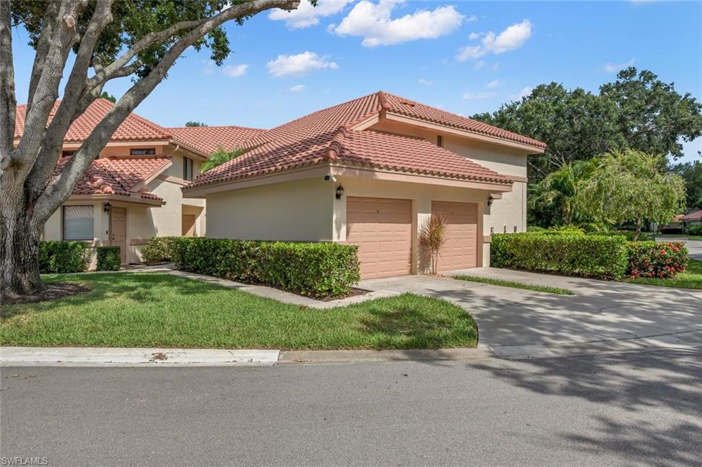 Welcome to this beautifully maintained turnkey corner residence in the desirable Coach
Homes at Berkshire Lakes. This bright and spacious three bedroom, two bath condominium offers
1,490 square feet of comfortable living with abundant windows that fill the home with natural light
and a private screened lanai overlooking peaceful garden views. The kitchen features granite
countertops, while the remodeled primary bath offers granite counters and a large walk-in shower.
Tile and wood laminate flooring flow throughout, and custom built-in cabinetry in the living room
adds both style and functionality. A spacious one-car garage provides extra storage and
convenience. Residents enjoy a newly renovated clubhouse with a resort-style pool and spa, along
with Berkshire Lakes Master Association amenities including tennis, pickleball, scenic walking and
biking paths around the lake, and a fishing pier.  Just a short walk to Berkshire Commons with Publix,
shops, and restaurants, and only 10 minutes from downtown Naples, Fifth Avenue South, and the
beautiful Gulf beaches. This is easy Florida living at its best.