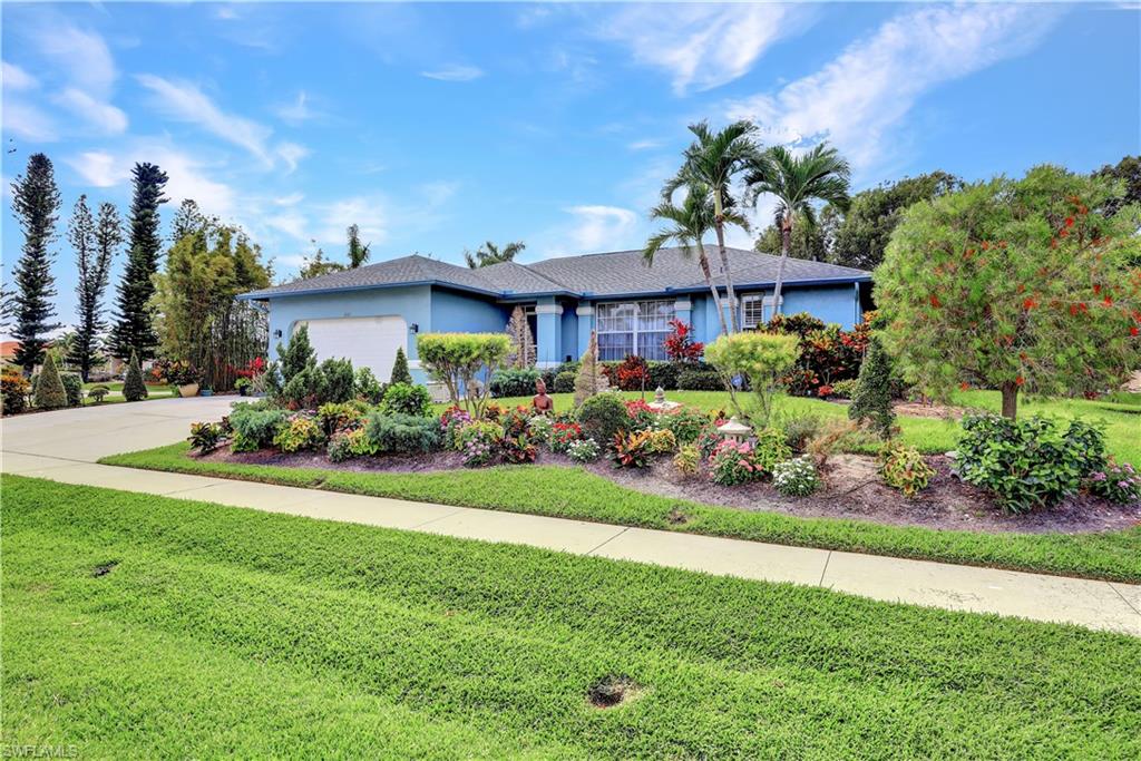 H9562 Welcome to your Zen Oasis on Marco Island. Nestled on an oversized  corner lot, this beautiful home,  greets you with a perfectly designed landscape. Bamboo hedges provide privacy to the home. Step through the screened front porch into a spacious living, kitchen, dining and family rooms, all open to the southern exposed lanai with solar heated pool and spa, which were refurbished in 2016. This home was remodeled in 2013 with a new kitchen, featuring a stunning subway glass tile backsplash to the ceiling, new cabinetry, stainless steel range hood, induction stove top and granite countertops. The ensuite bathroom is fully tiled with new cabinetry and marble backsplash from ceiling to vanity top. This home features gorgeous white porcelain tile throughout with volume ceilings and an abundance of natural sunlight. The expansive lanai offers room for dining al fresco as well as sunning areas. Electric storm shutters are fitted for optimum protection.  A new roof and pool cage were replaced in 2017 & 2018 respectively. Fieldstone Drive is located off the south end of Landmark Street, with close access to the Marriott, south end beach and Marco's best restaurants and shops.