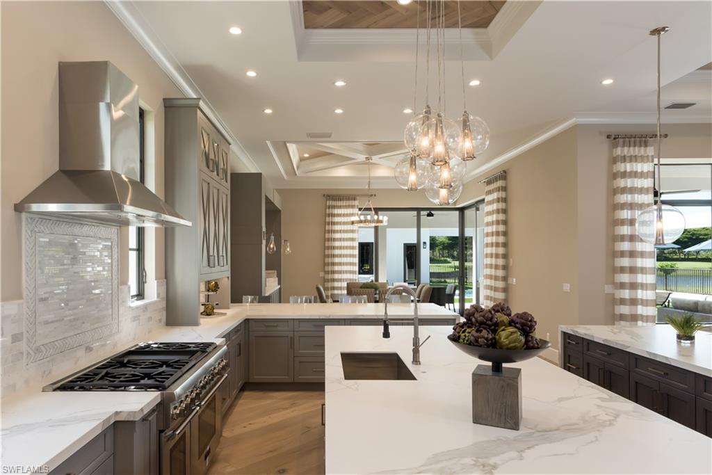 The furnished 5,847-square-foot, two-story Villa Ferrari residence, is priced at $3,990,000 million in Fairgrove. The four-bedroom, five-and-a-half bath great room plan includes a double island kitchen, a formal dining room, a wet bar, and a second-floor game room and lounge that opens to a covered terrace overlooking a massive outdoor living area and Fairgrove's parklike views. The Villa Ferrari's interior has been designed by Design West. The design team has created a comfortable and expansive interior for the Villa Ferrari that exudes clean-lined sophistication. French du Chateau antiqued light white oak hardwood flooring running on an angle will be found throughout the living areas. Contemporary metallic finishes will be mixed natural elements will be mixed with linen wall coverings. The color palette will include shades of gray with deep slates and dove grays mixed with pops of steel, navy blue, taupes, ivories and alabasters.