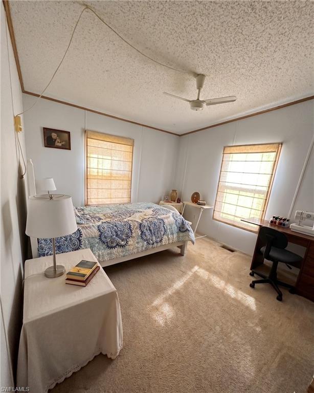 This oversized property is 2.87 acres of land with a DWMH 1558 sq ft 1987 3/2 home located in Flaghole Area, Seven K Estates, 15 min from the City of Clewiston. Home has a galvalume metal roof; interior is kept with built-in cabinets in the dining and bathrooms and large bedroom closets with a faux fireplace in the living room. Master bedroom has a shower and large tub. Carpeted throughout with linoleum in the kitchen and bathrooms. Open Porch in the back for those lazy afternoons. Oversized yard with a substantial amount of mature oak trees for shade. Property is located out of a flood zone area and off a paved road. On central water provided by Southshore Water Association. Electric provided by Glades Electric and on a septic tank system. Flaghole Area is a rural residential, golf-cart friendly subdivision that allows horses, cows, goat/sheep, chickens and caged animals. 1.5 hr from each coast, this property won't last long. Bring your cash deals, schedule your private showing today!