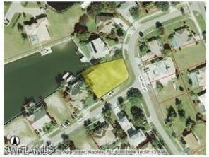 Huge price reduction....Build your dream home on this large corner lot. Room for a dock, quick out by boat through Smokehouse bay. Perfect location, close to shopping and restaurants.