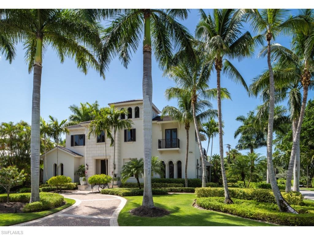 Coveted location situated along prestigious Gulf Shore Boulevard with only one home separating it from the sugar white sands of the Naples Beach! The meticulously maintained home has been extensively updated featuring beautiful wide plank wood flooring, a re-imagined kitchen, a renovated his/her master bathroom, a tastefully modernized and updated outdoor living and pool area, plus much more. The well-configured home features a first-floor master suite in addition to three generous guest suites, a large office, and theater/entertainment room. The home was designed to accommodate formal dinners or casual gatherings with equal ease. Both the formal living room and the spacious kitchen and family room areas open to the covered outdoor living spaces and pool deck beyond. It is a home which can be enjoyed as a destination in and of itself, yet is an address which places it near all that is truly wonderful about Naples.