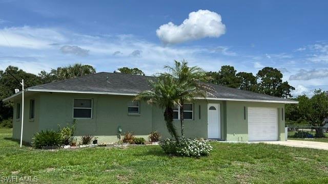 Beautiful 3 bed/2 bath/1 car-garage  (this is not a duplex). The property is set in a half-acre in a central location of Lehigh Acres. Recently completely painted inside and out. Close to schools, medical facilities, banks, stores, and main roads. No pets or smoking allowed inside the house.