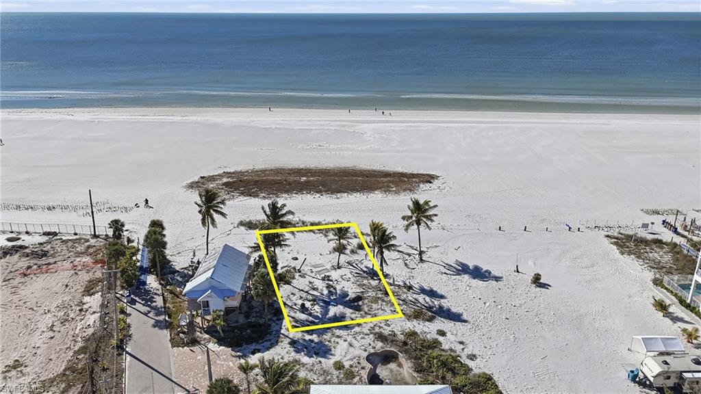 Prime Mixed-Use Opportunity in Downtown District – Endless Development Potential
Build Your Dream on the Gulf – Rare Fort Myers Beach Waterfront Opportunity  – Welcome to one of the most coveted offerings on Fort Myers Beach—a stunning direct Gulf-front lot where endless sunsets, sugar-white sand, and panoramic water views set the stage for your ultimate coastal retreat. This is a rare chance to design and build a custom luxury residence in one of Southwest Florida’s most desirable beachfront locations.
Wake up to the sound of waves, step directly onto the beach from your own backyard, and enjoy unobstructed views of the Gulf of Mexico from sunrise to sunset. Whether you envision a modern beachfront masterpiece or a classic coastal estate, this prime homesite offers the perfect canvas for a truly exceptional property.
Located just minutes from world-class dining, shopping, marinas, and the vibrant Times Square district, this lot combines privacy, prestige, and prime location—making it ideal for both a personal dream home or a high-end investment. Opportunities like this are exceedingly rare. Text Me to turn this Gulf-front dream into reality.