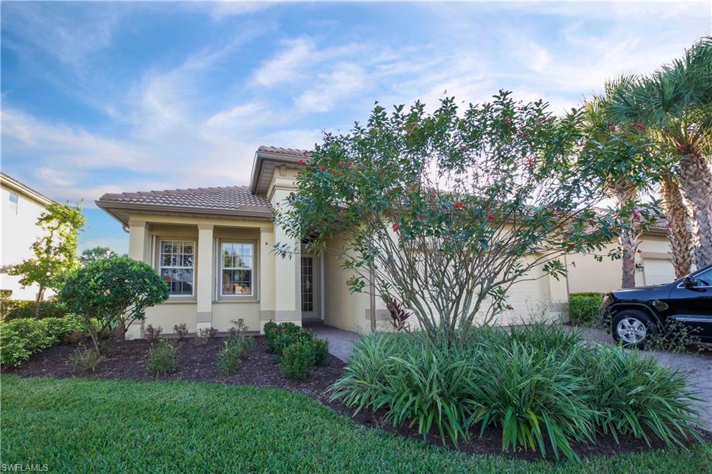 WOW!  Three bedrooms, 3 full bathrooms and a den HAS JUST BEEN REDUCED!!!!  This POOL HOME/spa  has nearly 2000 sq ft under air and an attached 2 car garage.  Nice warm colors, crown molding, hurricane shutters and a beautiful view of the water.  This home is as clean as a whistle, is move in ready and comes with a HOME WARRANTY FROM HOME-TECH.  Verandah offers 2 championship golf courses, a great tennis programs, miles and miles of biking and walking trails, kayaking and a doggy park for man's best friend.  The Caloosachatchee River is minutes from the front gate where you can enjoy boating, fishing, waver runners and water skiing.  Downtown Fort Myers is just a short ride west of Verandah and it's a quick ride off of I75 to the airport.  Fort Myers Beaches and Naples are less than 1 hour away.
