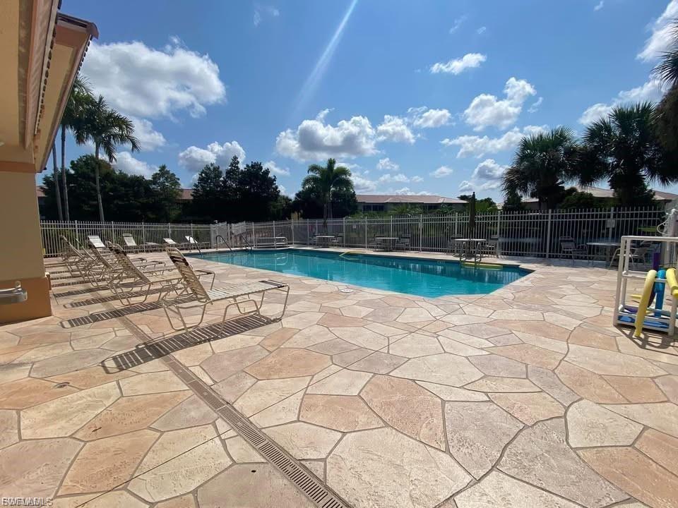 Welcome to your slice of paradise in the highly desirable Bellamar at Beachwalk! This beautifully updated, move-in ready 3-bedroom, 2-bath condominium is being offered turnkey, making it the perfect opportunity for a full-time residence, seasonal getaway, or investment property in one of Southwest Florida's most convenient locations. Ideally located just minutes from Fort Myers Beach, Sanibel Island, Captiva Island, shopping, restaurants, entertainment, and everyday conveniences, this home offers the Florida lifestyle you've been dreaming of.Step inside to an inviting open-concept floor plan featuring stylish furnishings and tasteful décor throughout. Luxury vinyl plank flooring in a warm wood finish flows seamlessly through the living areas and bedrooms, while the kitchen and bathrooms feature durable tile flooring. The updated kitchen showcases beautiful granite countertops, modern fixtures, and newer stainless-steel appliances, creating a space that's both functional and elegant. Updates including: • 2025 Community buildings currently being freshly repainted • 2022  Granite countertops, updated fixtures, and interior professionally repainted • 2022  New A/C condenser (air handler installed in 2016) • 2022  New refrigerator and microwave • 2022  New hot water heater • 2021  New community roof  Bellamar at Beachwalk is a gated, beautifully maintained community surrounded by mature landscaping, scenic ponds, tree-lined sidewalks, and well-lit streets. Residents enjoy resort-style amenities, including a sparkling community pool, clubhouse, and fitness center, all just one building from this unit. Low condominium fees include water, and the community welcomes two pets up to 30 pounds each. For investors, this property offers exceptional flexibility with excellent potential for seasonal rentals, annual rentals, or Airbnb-style income opportunities. Whether you're searching for a carefree Florida retreat, your next investment, or a place to call home year-round, this exceptional condominium checks every box. Opportunities like this don't last. Schedule your private showing today and discover why Bellamar at Beachwalk is one of Southwest Florida's most desirable communities