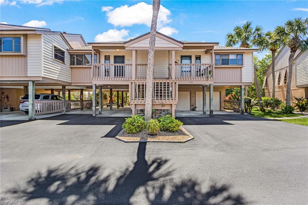 Welcome to Captains Harbor in beautiful Bokeelia—a quiet, well-kept community tucked away from street noise. This furnished, one-floor condo features a bright open layout with vaulted ceilings and triple sliders to a screened lanai overlooking a serene pond and lush landscaping.
The guest bedroom includes a generous walk-in closet. The primary suite offers a large walk-in closet and direct lanai access. A separate laundry room provides excellent storage.
Boaters will appreciate the private dock just steps away, complete with water, electricity, and a fish-cleaning station. Enjoy direct, no-bridge access to Charlotte Harbor for quick trips to open water, fishing, and the Gulf. There’s plenty of space for boat, trailer, and vehicle storage, along with covered storage under the building for additional gear.
Captains Harbor offers low HOA fees, solid financials, and professional management. Amenities include a quiet, heated community pool, tennis/pickleball, paved roads, and walking paths.
HOA covers water, sewer, and building, flood, and hurricane insurance.