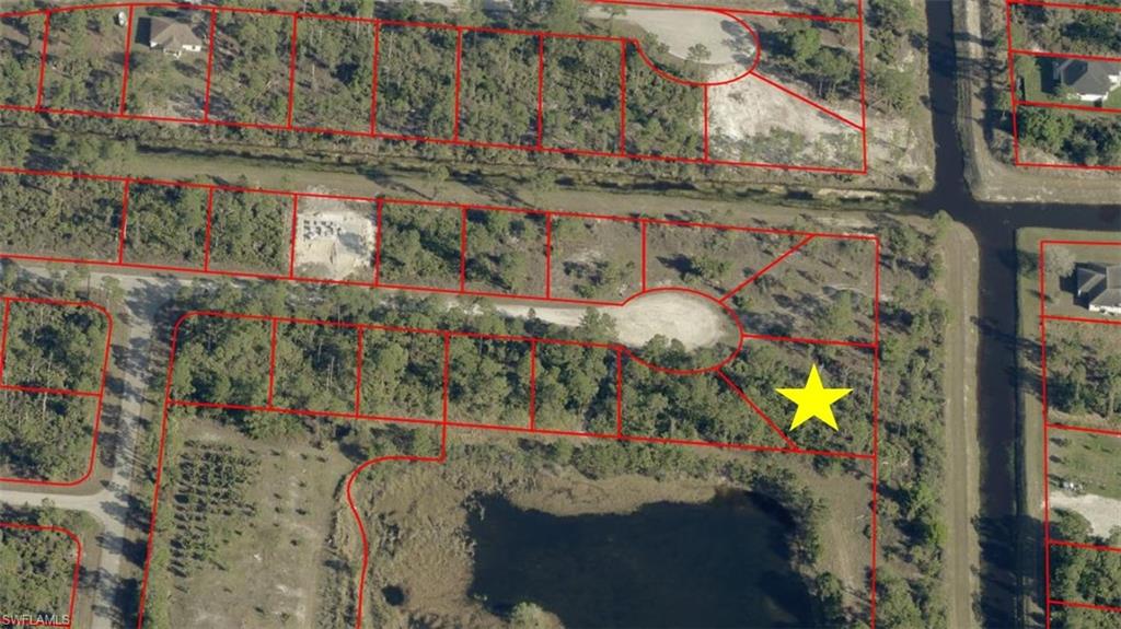 Oversized .42-acre cul-de-sac lot in a quiet, low-traffic neighborhood of Lehigh Acres complete with serene CANAL frontage and beautiful LAKE views! Enjoy the best of both worlds: convenient in-town living paired with the natural beauty of Florida right in your backyard. Nothing but nature sounds all around! This high-and-dry property is located outside of a flood zone, offering peace of mind and the perfect setting for your future home.