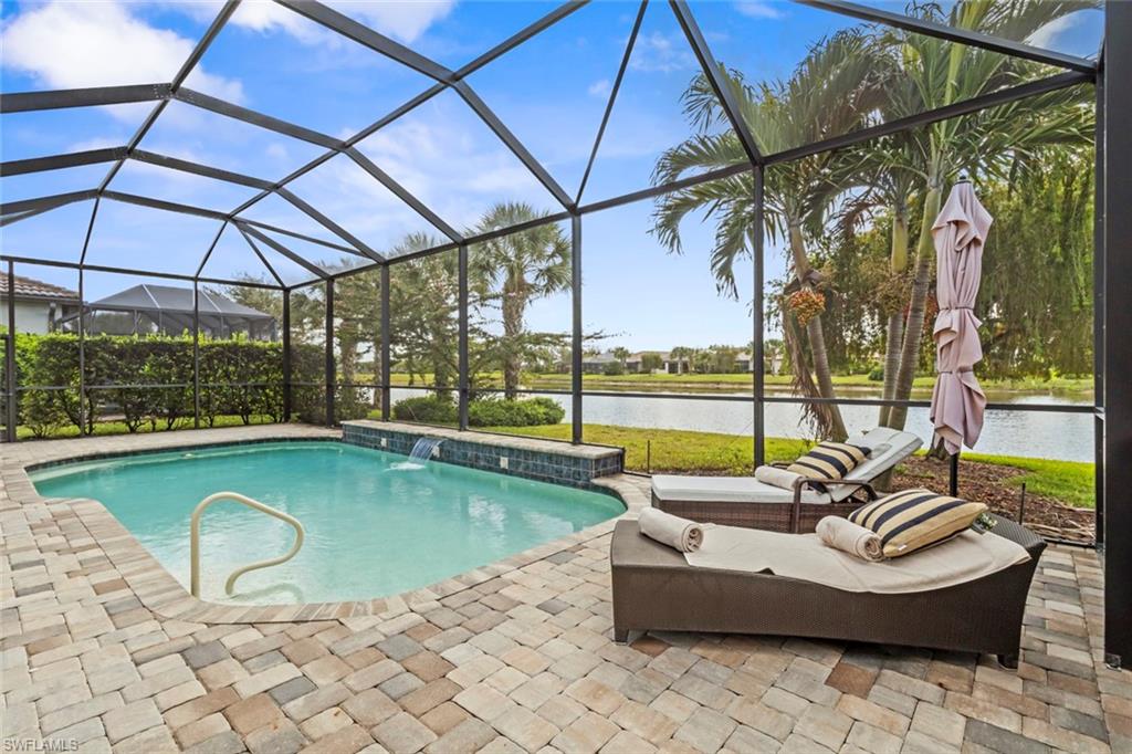 This RARE INFINITY floor plan is located in the 55+ Del Webb community. This SALTWATER POOL HOME showcases over $180,000 in upgrades and options, offering a seamless blend of luxury finishes, smart technology, and thoughtful design.
With 3 bedrooms plus a den and 3 full baths, this home was designed for both everyday comfort and effortless entertaining. The upgraded GOURMET KITCHEN serves as the heart of the home, featuring 42” upgraded cabinetry with soft-close pull-out drawers, a high-end cooktop, beverage cooler, wine and glass rack, and designer lighting.
Soaring 11’ RAISED COFFERED CEILING and 21x21 diagonal tile flooring throughout the main living areas, den, and PRIMARY SUITE create a spacious and refined atmosphere.
The PRIMARY SUITE offers a true retreat, complete with a tray ceiling, large walk-in closet, and a spa-inspired bath featuring a walk-in shower, soaking tub, and dual vanities.
Step outside to your PRIVATE LANAI, where the HEATED SALTWATER POOL creates the perfect setting for relaxation or entertaining.
This home is further enhanced by a comprehensive SMART HOME PACKAGE including a wireless access point, voice control, smart garage opener, smart door lock, and smart thermostat. IMPACT WINDOWS AND DOORS provide excellent storm protection, and a Storm Smart HURRICANE SCREEN adds additional convenience and peace of mind.
ADDITIONAL UPGRADES include a built-in CALIFORNIA CLOSET office system in the den, CROWN MOLDING throughout, a front screened entry, WHOLE HOUSE WATER PURIFICATION SYSTEM, security system, upgraded front-load washer and dryer, window treatments, and an exterior light package with keyless entry. 
The 3-CAR GARAGE features a 4’ EXTENSION, EPOXY FLOORING and the GOLF CART IS INCLUDED.
Furniture is negotiable, and a QUICK MOVE-IN is available.
Meticulously maintained and better than new, this luxury Infinity floor plan offers the SOCIAL MEMBERSHIP, but take note GOLF LOVERS,  Panther Run Golf Club offers optional MEMBERSHIPS with premium golf experiences just steps from your backyard.
In Del Webb Naples, you’ll enjoy WORLD-CLASS AMENITIES that rival luxury resorts: dine at the Rusty Putter Restaurant, soak in the RESORT-STYLE or LAP POOLS, break a sweat in the state-of-the-art FITNESS CENTER, and play your way through PICKLEBALL, TENNIS, bocce, billiards - even a top-tier GOLF SIMULATOR!
Need groceries, church, or a bite to eat? Just hop in your golf cart and cruise into town - Publix and the heart of Ave Maria are just minutes away.
This isn’t just a home - it’s a LIFESTYLE UPGRADE in one of Southwest Florida’s most vibrant 55+ communities. Don’t miss your chance to live where fun, fitness, and friendships flourish year-round!