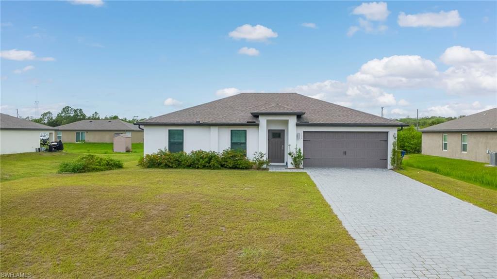 Welcome to 150 Blackstone Drive, a beautifully crafted newer-construction home nestled in the growing Mirror Lakes area of Fort Myers. This thoughtfully designed 3-bedroom, 2-bath residence offers the perfect blend of modern style, comfort, and functionality. The open-concept floor plan creates a bright and inviting atmosphere, seamlessly connecting the living, dining, and kitchen areas—ideal for entertaining guests or enjoying everyday life.

The spacious kitchen features granite countertops, modern cabinetry, and energy-efficient appliances, providing both beauty and practicality. The private primary suite offers a peaceful retreat with ample closet space and an en-suite bath, while the additional bedrooms provide flexibility for family, guests, or a home office.

Built with modern construction standards and impact-resistant windows, this home offers peace of mind and low-maintenance living. Situated on an oversized lot, the backyard is a blank canvas ready for you to create your own outdoor retreat—whether you envision a sparkling pool, tropical garden, outdoor kitchen, or the ultimate space for relaxing and entertaining under the Florida sunshine.

Conveniently located near shopping, dining, golf courses, parks, and Southwest Florida's beautiful beaches, this move-in-ready home offers the perfect opportunity to enjoy the Florida lifestyle while adding your own personal touch. Whether you're searching for your first home, a seasonal getaway, or an investment property, 150 Blackstone Drive is ready to welcome you home.