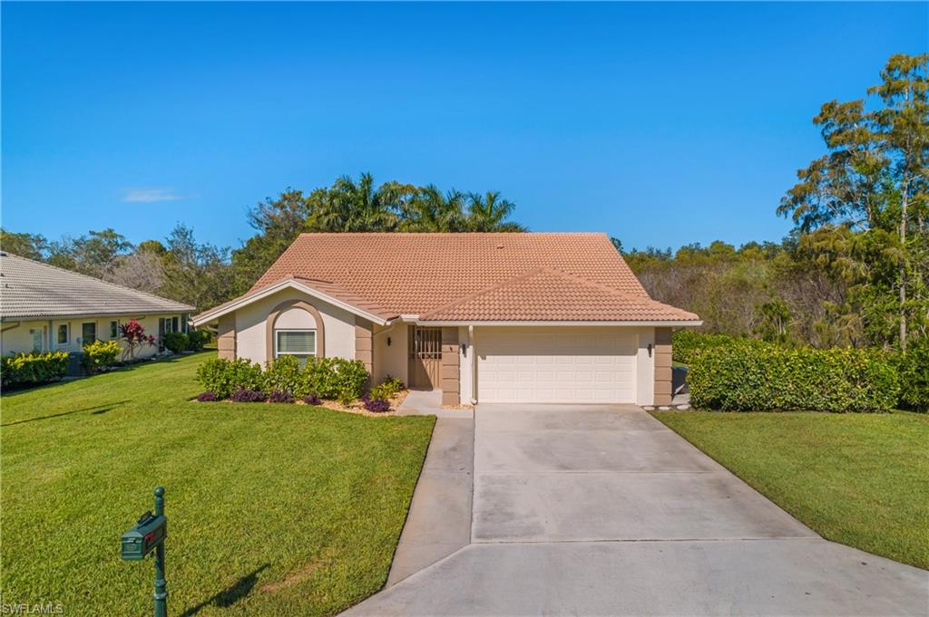 One or more photo(s) has been virtually staged, AI generated or rendered.  Welcome to this beautiful 3-bedroom, 3-bath home located in the highly sought-after Countryside Golf & Country Club community. Perfectly positioned on the private preserve lot, this bright and inviting residence offers breathtaking views and modern upgrades throughout. The spacious open-concept floor plan features a beautifully updated kitchen that flows seamlessly into the living and dining areas, creating the perfect space for entertaining family and friends. A bonus room provides additional living space and endless possibilities for a home office, media room, or gym. The kitchen boasts abundant cabinetry, generous counter space, a large center island with granite countertops, and seating for four. Additional storage is provided by a walk-in pantry and combination laundry room conveniently located off the kitchen. Recent upgrades include luxury vinyl plank flooring throughout, electric storm shutters, and a whole-house generator with a 500 gal long propane tank that provides peace of mind during Florida storms. The home also features a private well irrigation system, helping maintain a lush, green lawn while reducing water costs. Residents enjoy access to the newly renovated Countryside Golf & Country Club, featuring championship golf, tennis, pickleball, fitness facilities, dining, social activities, and resort-style amenities. Located just minutes from Naples’ world-famous beaches, Fifth Avenue South, fine dining, shopping, and entertainment.