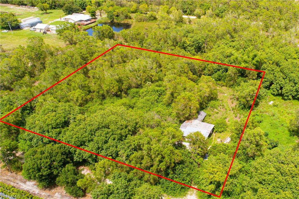 Opportunity to own 2.5 Acres in 6Ls Farm community. Their is a home on the lot but it is a tear down. Well and septic and electric are on and servicing the existing structure. Being offered for lot value. Home to the south is a new construction home and other new homes have been built recently in the community.