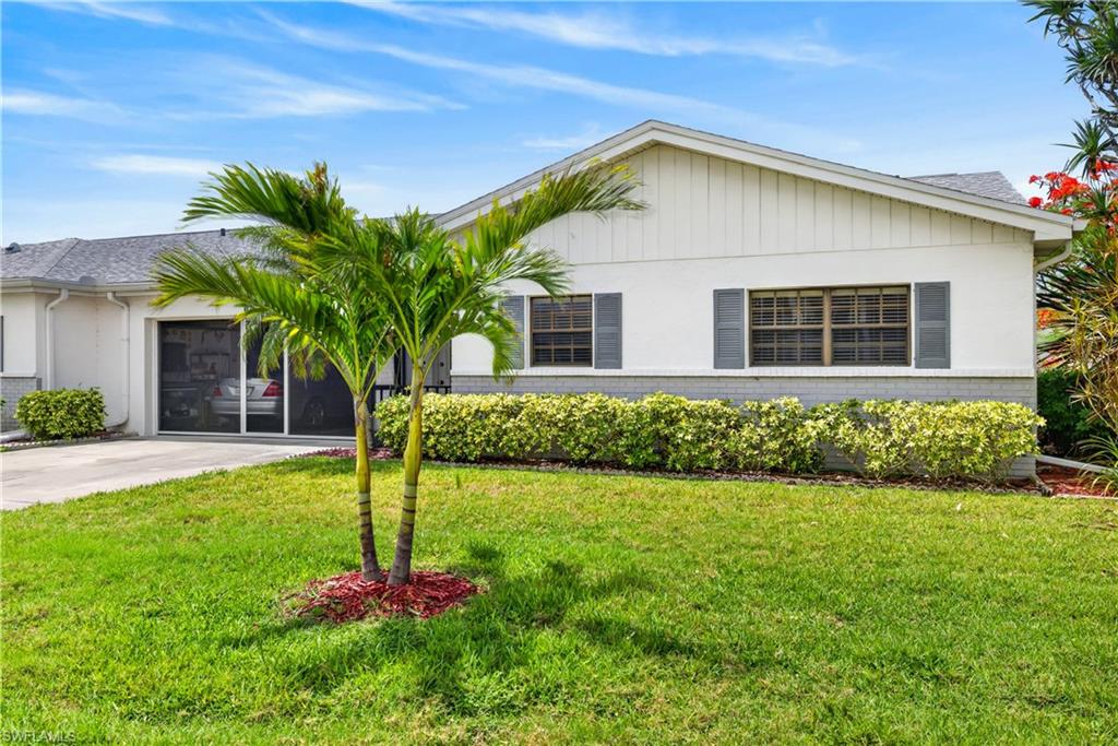 Welcome to easy, carefree living in this beautifully maintained turnkey villa located in a highly desirable 55+ community with no special assessments. This spacious attached villa offers 3 bedrooms, 2.5 bathrooms, and a 2-car garage with abundant storage cabinets, a workbench, PULL Down screen while you are working in the garage and a private garage entrance leading directly into the ensuite guest suite or home office—perfect for visiting family and friends.

Designed for both comfort and convenience, this home features a newer roof (2022), newer A/C system(2025), newer water heater, automatic hurricane shutters, and a security system, providing peace of mind whether you're home or traveling.

The inviting kitchen showcases beautiful real wood cabinetry, black granite countertops, and a breakfast bar that overlooks the dining and living areas, creating an ideal space for entertaining. Tile and luxury LVP flooring flow throughout the home, offering both beauty and easy maintenance.

The spacious owner's suite comfortably accommodates a king-size bedroom set and features generous closet space, including a built-in safe for your valuables. The ensuite bath includes a walk-in shower for added convenience. Two additional guest bedrooms provide ample space for visitors, hobbies, or a home office, while numerous storage closets ensure everything has its place.

One of the home's most enjoyable features is the air-conditioned Florida room, where you can relax with your morning coffee, enjoy a good book, or simply take in the peaceful lake views and water feature year-round. Just steps away, you'll find the community pool, making it easy to enjoy Florida's sunshine and social atmosphere.

Residents love this friendly and well-established community for its exceptional location, placing you close to shopping, dining, entertainment, healthcare facilities, golf courses, and Southwest Florida's world-famous beaches.

If you're looking for a low-maintenance lifestyle with comfort, security, and convenience, this move-in-ready villa may be exactly what you've been waiting for. Schedule your private showing today and discover why so many residents love calling this community home.