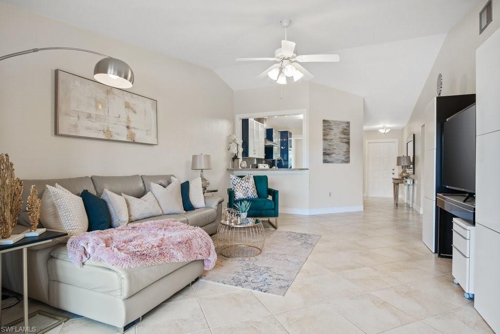 Walking distance to Waterside Shops for shopping and dining spots, and Seagate beach! Wonderful "Naples paradise" location to call home or use as rental income - 12 rentals per year! INCLUDES 1 YEAR HOMEOWNER'S WARRANTY! 2 bed/2 bath second floor unit with plenty of updates, ready for you to just move in! Kitchen features granite countertops, stainless steel hood, and modern cabinetry for plenty of storage space. Separate dining area with plenty of room for family gatherings and holiday dinners. Large living room with sliders to your private, screened balcony - great for watching the sunrise with a cup of coffee, or unwinding after a day at work or the beach. Large master bedroom with private bath has sliders leading to balcony. Large second bedroom. Both bathrooms have updated tiled showers and modern cabinetry. Washer and dryer in the unit, no trips to the laundromat! Tile flooring throughout including the balcony. Community pool and 1 assigned parking space.  Pet friendly too!