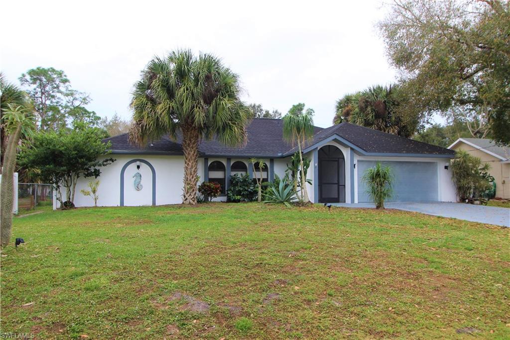 Almost 1 full acre Vinyl Fenced! No Flood Zone! Fresh paint inside and out and all new floors! 4 Bedroom 2 Bathroom Pool Home now available in Port Charlotte. This large home is move-in ready. The lanai and heated pool with new pump overlook the serene and nicely landscaped back yard where your family can enjoy hours of entertaining. The split floor plan has 3 bedrooms on one side of the home and a bathroom offering direct pool access. The other side of the home has a full master suite with pocketing sliders to the pool. This home has 4 sets of sliders to the lanai area and was built with entertaining in mind. Enjoy your own private park in the shaded backyard or take a quick trip to nearby Kiwanis Park. Located in a fantastic area of beautiful homes and quiet neighborhoods. You will have quick access to 776 to get you to the beaches nearby. Also Convenient to Edgewater Drive for dining, shopping and boating in Port Charlotte or Punta Gorda. You will love the location. If you want a large private yard with a great entertaining home and a screened in pool call your agent today! Home has been re-plumbed and has a newer hot water heater.