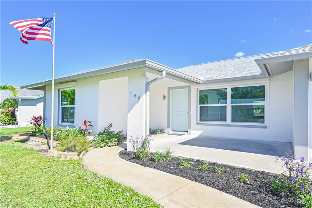 TOTAL REMODEL! BRIGHT & CLEAN!! LIKE A BRAND NEW HOME!!! This gorgeous 2BR/2BA with an additional Florida Room has 1,527 S/F under air and has undergone a MAJOR RENOVATION with no expense spared. NEW features include new tile flooring with 5 1/2 inch baseboards throughout, new impact resistant doors and windows, new crown molding, a spacious kitchen with new cabinets, new quartz countertops, new stainless steel appliances and new light fixtures; a new washer and dryer, new plumbing, new electrical for the majority of the home, new fans, a new A/C condenser unit, new new new, the list goes on. The bathrooms have been refinished with custom tile work and made handicap accessible. There are dual closets in the master bedroom with plenty of room for two extensive wardrobes. Everything has been thought of- there's even a well specifically for lawn irrigation. Riviera Golf Estates is a quiet 55+ community with many amenities such as a heated swimming pool and tennis/pickleball courts, all for the LOW HOA FEE of just $87/MO. Don't let this one slip away- come see this custom home for yourself!