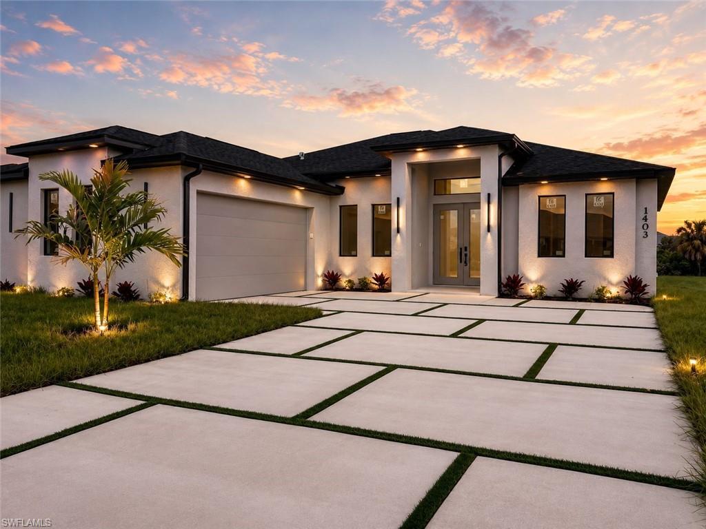 DESIGNED TO IMPRESS. BUILT TO INSPIRE. This is not a cookie-cutter NEW CONSTRUCTION. This stunning freshwater canal residence blends clean architectural lines, elevated finishes, and effortless luxury into one exceptional waterfront retreat. Inspired by today's most sought-after organic coastal designs, every detail has been thoughtfully curated to create a home that feels sophisticated, inviting, and distinctly different from the ordinary.

Perfectly positioned on a freshwater canal in Northeast Cape Coral, this newly completed home offers 3 bedrooms, 3 full bathrooms, a versatile flex space, and over 1,600 square feet of beautifully designed living space. Soaring 12.5-foot ceilings, smooth-finish walls, marble tile flooring throughout, and oversized impact-resistant windows create a bright, airy atmosphere filled with natural light.

The designer kitchen serves as the heart of the home, showcasing sleek European-inspired cabinetry, stainless steel appliances, matte black fixtures, a spacious center island, and a generous walk-in pantry. The open-concept layout seamlessly connects the kitchen, dining, and living spaces, creating an ideal setting for both entertaining and everyday living.

The thoughtfully designed floor plan includes a flexible bonus space perfect for a home office, fitness room, media lounge, or creative retreat. The spacious primary suite offers a private sanctuary complete with dual walk-in closets, a linen closet, and a beautifully appointed ensuite bath designed with both comfort and style in mind.

Every detail of this home was designed to balance luxury and functionality, including impact-resistant windows and doors, an interior laundry room, an epoxy-coated 2-car garage, and a convenient utility wash station ideal for pets, gardening equipment, or outdoor cleanup.

Step outside and embrace the beauty of waterfront living. Enjoy peaceful canal views, morning coffee by the water, afternoons spent kayaking or fishing, and the serenity that comes with having your own freshwater canal frontage. The spacious backyard offers the perfect setting for outdoor entertaining and provides ample room to design and build the pool of your dreams while still enjoying generous green space and unobstructed water views.

Conveniently located near shopping, dining, schools, and major roadways, this property offers the perfect blend of luxury, functionality, and Florida waterfront living in one of Cape Coral's fastest-growing areas.

Whether you're searching for a primary residence, seasonal retreat, or investment opportunity, this move-in-ready home delivers a lifestyle defined by modern design, waterfront tranquility, and timeless appeal.

Virtual Staging Disclosure: Certain photographs may include AI-generated virtual staging. Furnishings, décor, and design elements shown are for illustrative purposes only and are not included in the sale of the property.