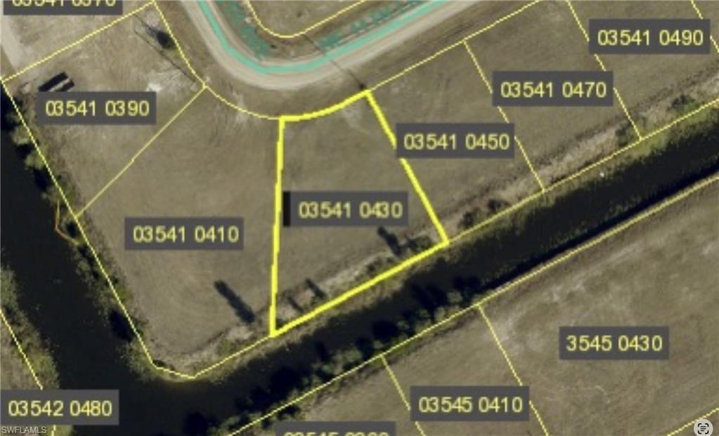 "Spacious Freshwater Canal Lot Available for Sale - Ideal for Building Your Dream Home"

Are you in search of the perfect location to build your dream home? Look no further than this oversized freshwater canal lot that is now available for sale. Situated in a prime location, this lot offers ample space and a tranquil setting for you to create the home of your dreams.

With easy access to the water, you can enjoy all the benefits of waterfront living right from your own backyard. Imagine waking up to stunning water views and spending your days fishing, boating, or simply relaxing by the water's edge.

Don't miss out on this incredible opportunity to own a piece of paradise. Contact us today to learn more about this freshwater canal lot and start planning your dream home.