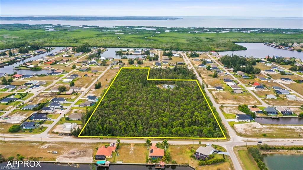 Great development opportunity.  One of the few commercial land assemblages on Old Burnt Store Road, with a direct connection on Kismet Pkwy W to Burnt Store Road.  The CAC future land use district and NC Neighborhood Commercial Zoning allow free standing commercial development up to 1 FAR, free standing multi-family for 15 to 85% of the Property with a density of between 12 to 16 du/acre and compound mixed use buildings up to 2 FAR.  Less than 2 miles north of the Seven Island development.  NW Cape affords direct boating access to residents and has some of the highest household incomes in the City.  The N3 utilities scheduled to be in place by 2028.  More information available upon request.