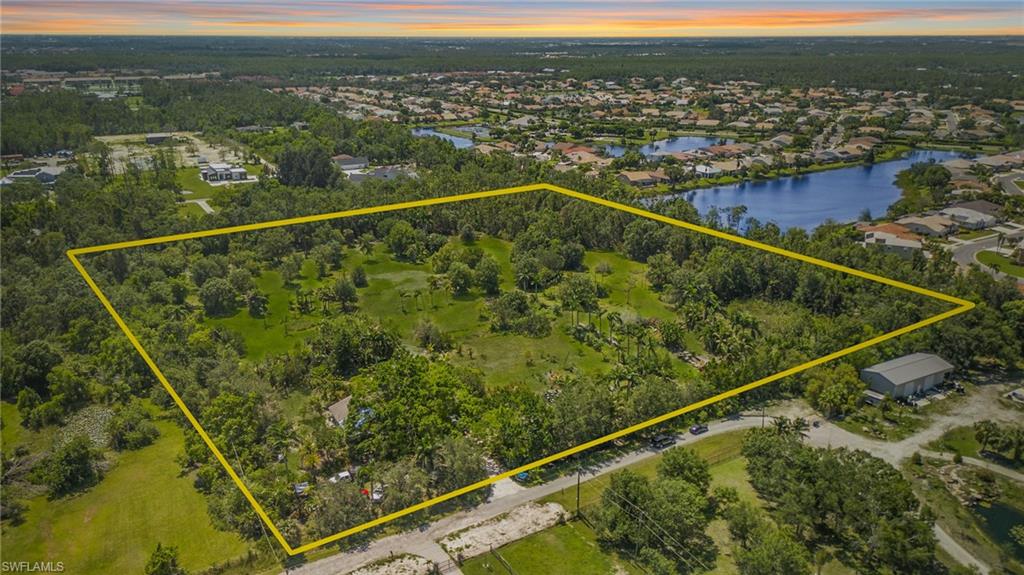 A unique, private piece of paradise tucked away in the heart of Fort Myers. This 10-acre property is a rare gem and a truly luxurious offering. Located in one of the most sought-after areas in the city, this expansive land invites endless possibilities for both buyer and investor. Surrounded by untouched natural beauty and a peaceful, almost storybook setting, it feels worlds away—more like the quiet countryside of the Carolinas than Southwest Florida. Towering trees, open skies, and a sense of stillness create an atmosphere that is truly one of a kind. Offering complete tranquility, 10 acres of preserved landscape are yours to explore. The property features two ponds and several open clearings, perfectly suited for building. Whether you envision a private estate retreat or a thoughtfully designed residential enclave, the opportunities are boundless. With generous space and natural charm, this is a place where imagination can take root. Just a short drive from I-75, RSW, and the area’s most desirable destinations, this property balances convenience with rare seclusion. Don’t miss the opportunity to own this exceptional piece of land in one of Florida’s most sought-after locations. A 1,400-square-foot office is currently situated at the front of the property.
