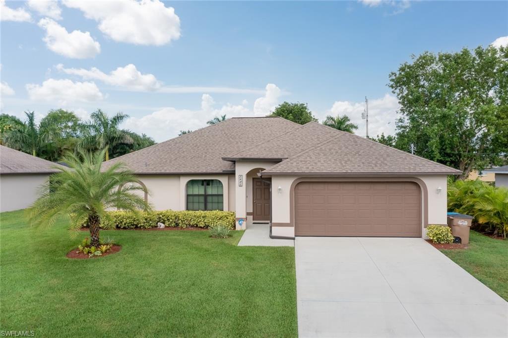 This beautiful home located in a quiet neighborhood is the ideal place to create new memories and grow. The open floor-plan creates a light and airy space that is perfect for hosting any type of gathering or simply enjoying the soft morning rays. Lovely stone counters and stainless steel appliances welcome you into the kitchen. The window right behind the sink filters in the morning rays and provides a spectacular view into the manicured backyard. Tile throughout the main areas and wood in the bedrooms create soft palette changes throughout the space. The three guest rooms are spacious and can be turned into any type of space: office, playroom, or your regular bedroom. The high ceilings in the home open the space further and bring light into the home. The owner's bedroom is spacious with tray ceilings and sliding glass doors that open into the large lanai. Two walk-in closets lead the way into a spa-like owner bathroom with dual sinks and a gorgeous walk-in shower. The outside of the home is magnificently landscaped and waiting for those personalizing touches.