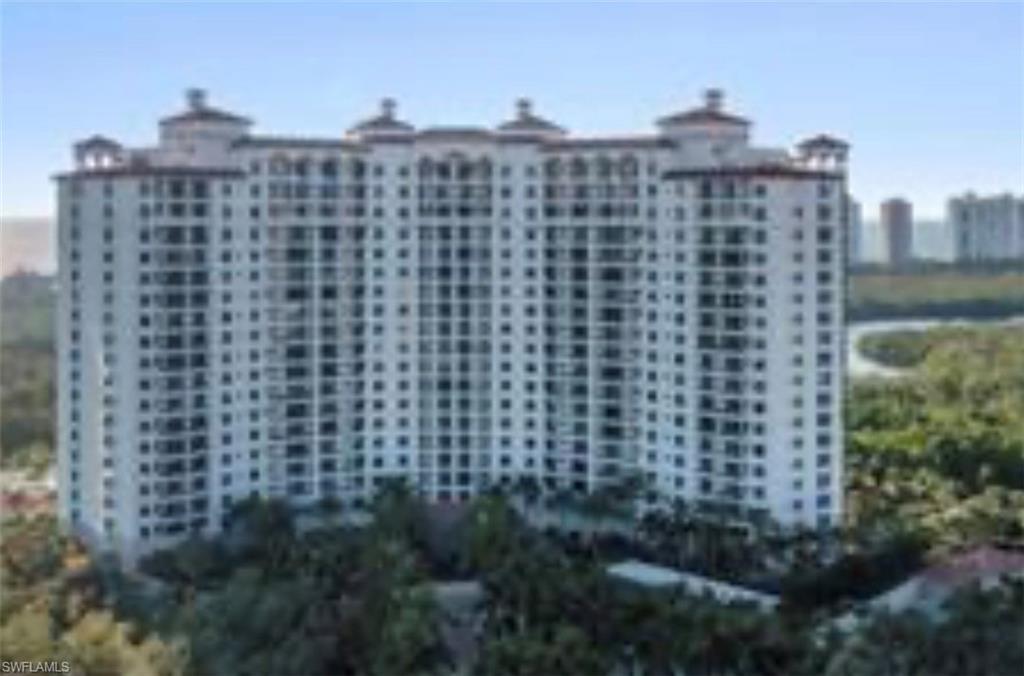 Leave your keys behind, as you are centrally located on the berm with easy access to the beaches, trams and tennis. Pelican Bay offers two private beach clubs with miles of white sandy beach, two beach restaurants, a community center with workout facilities and 18 Har-Tru tennis courts. The amenities and active lifestyle of Pelican Bay cannot be beat. This is luxury, indoor/outdoor living at its finest!