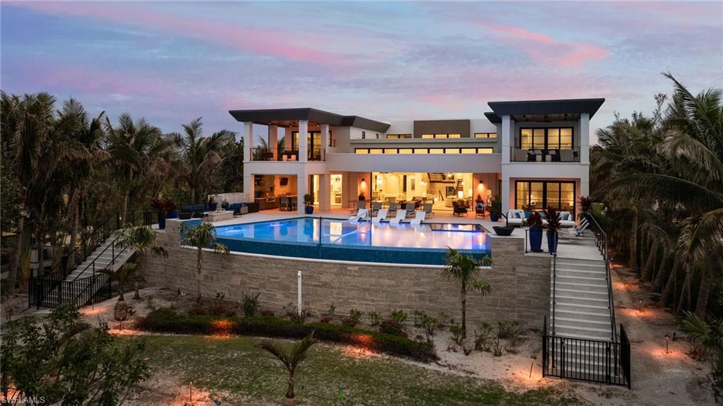 Arguably the most architecturally significant home to ever be brought to market on Captiva, Bella Luna was nationally recognized for impeccable design when it received the American Institute of Building Design’s (AIBD) prestigious American Residential Design Award (ARDA) in 2021. Conceptualized by the renowned Wayne Visbeen of Visbeen Architects, Bella Luna reflects the exceptional craftsmanship and innovative design for which the firm is celebrated. Known for collaborating with prestigious clients such as Metropolitan Museum of Art, Martha Stewart and Disney, Visbeen Architects brings the same level of artistry and attention to detail to residential projects, making this property a masterpiece of design and livability. Constructed to be a fortress of concrete and steel, the substantial nature of the structure is resilient yet refined. Employing hotel and hospitality design techniques, every detail was meticulously tailored to enhance human experience through sophistication and functionality, creating intimate experiences within the grandeur of larger spaces. A feature sheet is available detailing the extensive upgrades, features and breathtaking attributes.