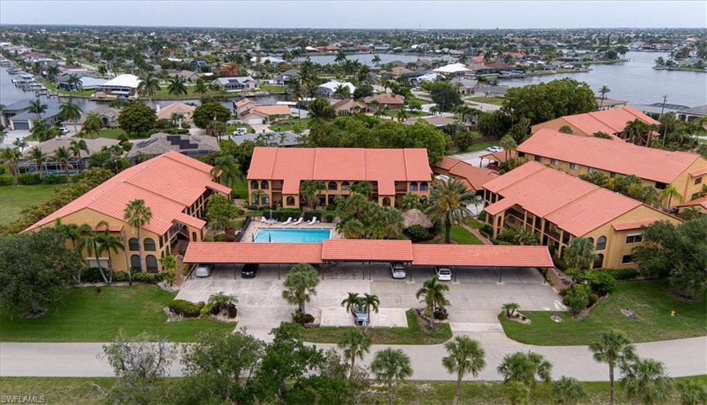 Welcome to Rosegarden Condominium, where tropical Florida living meets comfort and convenience. This spacious 2-bedroom, 2-bath residence offers an inviting floor plan with plenty of room to relax and entertain. Nestled in a beautifully maintained community featuring lush tropical landscaping and charming Spanish-inspired architecture, you'll feel like you're living in a private resort.

Residents enjoy access to the community pool and relaxing spa, all while being centrally located in the heart of Cape Coral. You'll be just minutes from shopping, dining, entertainment, parks, and everything this vibrant waterfront city has to offer.

Whether you're looking for a year-round residence, seasonal retreat, or investment opportunity, this home delivers the ideal blend of location, lifestyle, and value. Furnishings are negotiable, making your move to paradise even easier.
