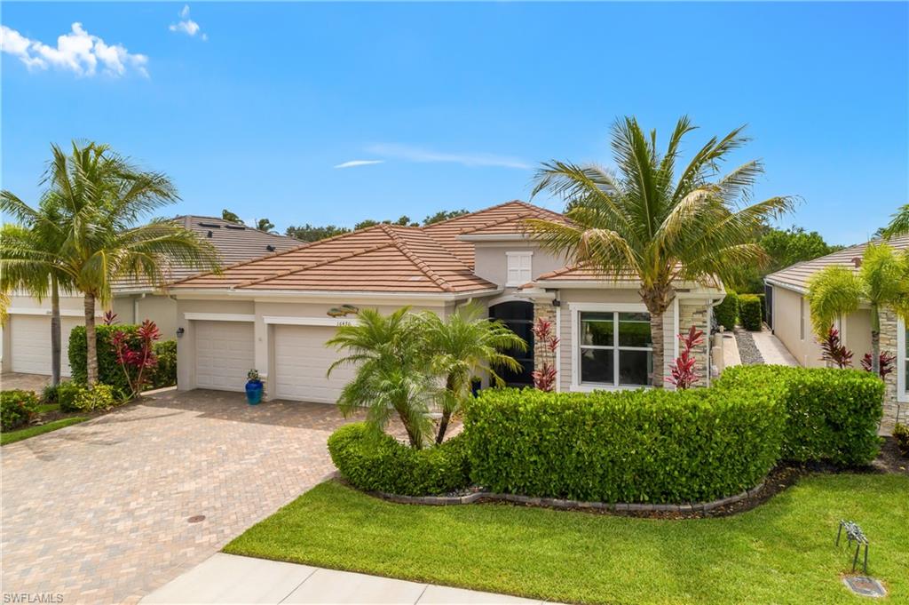 Welcome to this well maintained and beautifully updated single-family home featuring a spacious screened-in pool and spa with a soothing waterfall feature — the perfect setting for year-round outdoor enjoyment and entertaining in sunny SW Florida.
This home offers excellent curb appeal with its elegant beige stucco exterior, slate-look tile roof, stone accents, and a wide paver driveway leading to a 3-car garage. Lush tropical landscaping with mature palm trees enhances the resort-style feel, while the fully fenced backyard includes a generous lawn for privacy and play.
Inside, the bright, open-concept layout impresses with 4 bedrooms and 2 bathrooms, fresh interior paint, and beautiful porcelain plank tile flooring throughout. The gourmet kitchen features white shaker cabinets, granite countertops, a tile backsplash, a large island, and high end Kitchen Aid stainless steel appliances, including an induction cook top range, side-by-side refrigerator, and built-in microwave.
Additional highlights include:
Insulated and climate controlled garage. 
Expansive screened lanai perfect for dining and relaxing.
Inviting outdoor patio/fire pit seating area.
A paver side walk accented with decorative rocks to walk around back to the lanai.
A paver area on the side of the garage for storage of things that should be outside.
The front of the home offers a paver sitting area framed by privacy landscaping to enjoy your morning coffee.
The safe and spacious backyard is ideal for family gatherings or watching the kids and dogs play.
This home has neutral finishes and high-quality details throughout.

This move-in ready home perfectly blends comfort, style, and Florida living at its best. Whether you're unwinding by the pool, hosting around the fire pit, or cooking in the chef-inspired kitchen, every day feels like a vacation.
Ideal for families seeking a low-maintenance luxury lifestyle in a wonderful community. Don’t miss out — schedule your private tour today!