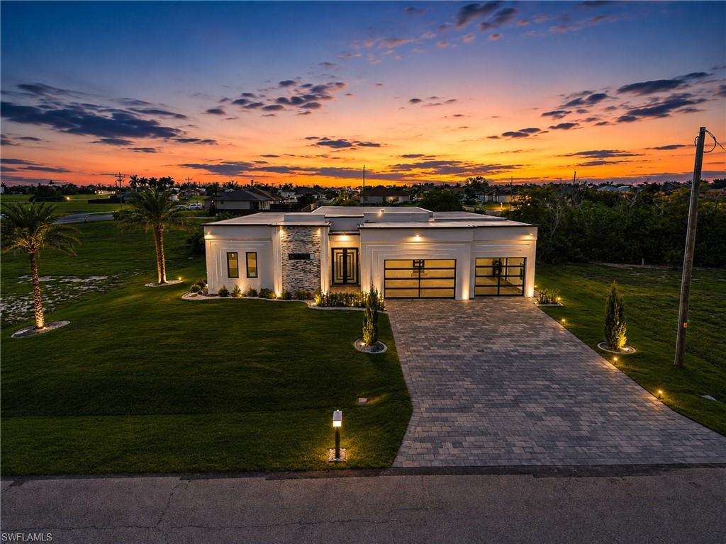 Luxury Waterfront Masterpiece | Direct Gulf Access. Discover an extraordinary expression of modern luxury in this exceptional Gulf-access estate, thoughtfully designed for those who demand elegance, sophistication, and the finest waterfront lifestyle. Boasting 3,265 square feet of living space, this architectural masterpiece offers 5 spacious bedrooms, 6 luxurious bathrooms, and soaring 10-foot ceilings that create an impressive sense of openness throughout. The expansive open-concept floor plan seamlessly blends indoor and outdoor living, showcasing designer finishes, clean architectural lines, and walls of glass that flood the home with natural light while capturing breathtaking water views. The chef-inspired kitchen serves as the heart of the home, featuring premium finishes, custom cabinetry, and an oversized island perfect for entertaining. Step outside into your private resort-style oasis, where a heated swimming pool overlooks the tranquil canal, creating the perfect setting for relaxation or unforgettable gatherings. With direct Gulf access, this property is a dream for boating enthusiasts, offering effortless access to world-class fishing, beaches, and the Gulf of Mexico. Perfectly positioned in one of Cape Coral’s most desirable waterfront locations, this residence delivers an unparalleled combination of luxury, comfort, and coastal elegance. Whether as a full-time residence or an exclusive vacation retreat, this is a rare opportunity to own a premier piece of Southwest Florida waterfront real estate. Schedule your private showing today and experience the ultimate in luxury waterfront living.