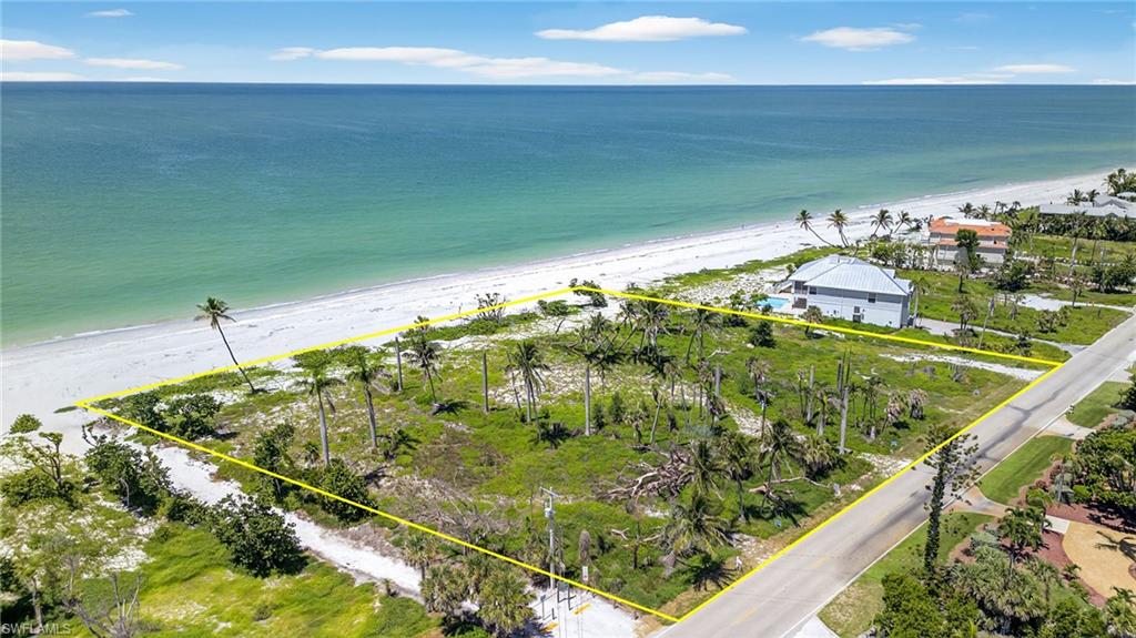 300 feet of beachfront along the prestigious and coveted West Gulf Drive! This is an incredible opportunity! Rarely do multiple adjacent parcels become available on this barrier island location... to have three contiguous properties that create this vast building site is truly exceptional. Construct three amazing Gulf- front homes, create a family compound or build a magnificent Gulf-front estate: your vision can be accommodated on this exceptional expansive property. The building site on this property is far closer to the Gulf than it is on much of the island, determined by the coastal construction setback line. The gentle sounds of the surf can truly be the backdrop of your island life and the shoreline just outside your new home. Panoramic water views, dolphin and avain sightings and phenomenal shelling set the tone for the relaxing beach environment.  As you drive across the Causeway onto Sanibel, it is not a step back in time but a step away from time. There are no street lights, stop lights, or billboards. Over 60% of the island is designated for conservation, yet all of the daily amenities you need are here. Sanibel is a way of life that ensures tranquility and peacefulness... this property takes this to a higher level. 300 feet of Gulf front living. Privacy. Tranquility. Beachfront living. Amazing.