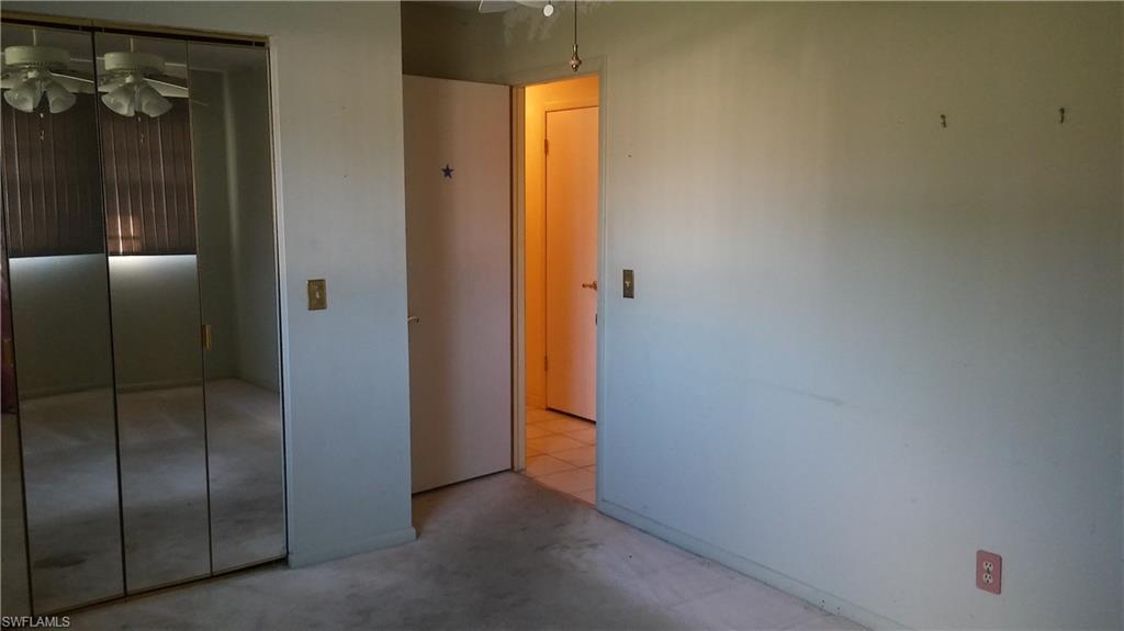 Handyman Special:  3/2/1 Comes on 4 lots wooded backyard and lots. Quiet neighborhood Minutes to shopping  (Coconut Point, Miramar, and Gulf Coast)  Three Oaks School, San Carlos School.