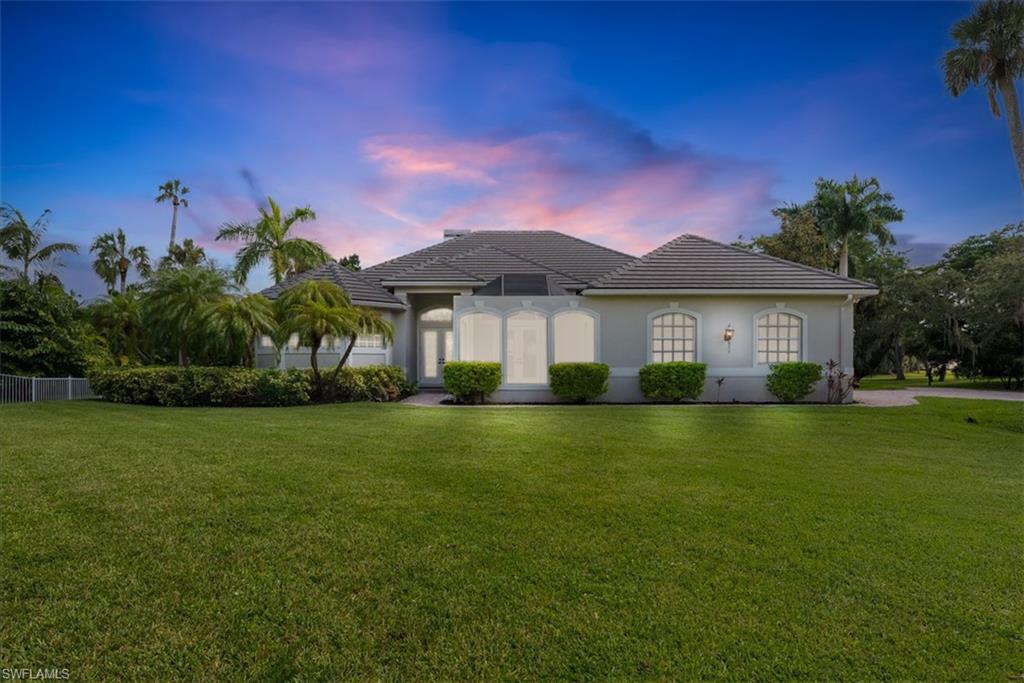 Step into contemporary elegance in this fully remodeled residence located in Skyline Woods, an intimate, gated enclave just minutes from the energy of downtown Fort Myers. Built in 2003 and offering over 2,900 square feet of living space, this home features soaring high ceilings, thoughtful upgrades throughout, and a layout designed for both comfort and entertaining. The interior showcases a brand-new modern kitchen featuring a large quartz island ideal for entertaining, full quartz backsplash, and custom cabinetry with soft-close finishes. A built-in bar enhances the entertaining experience, while bathrooms throughout the home feature floating vanities for a sleek, modern aesthetic. Additional interior features include a floor safe the stunning owner's suite. Outdoors, the property unfolds into a private retreat set on a rare 1.1+ acre lot with abundant backyard space, lush landscaping, and majestic old-growth oak trees. The resort-style setting is anchored by a PebbleTec, chlorine, vanishing-edge pool with a new pump, tranquil water features, and an in-ground spa. An outdoor kitchen completes the space, making it ideal for spending time outdoors and relaxing under the stars. Recent upgrades include a new roof (2 years old), new AC systems (2 years old), and an upgraded hot water heater (2 months old), offering peace of mind and long-term comfort. This exceptional property seamlessly blends privacy, luxury, and proximity, delivering a lifestyle that is as serene as it is convenient.