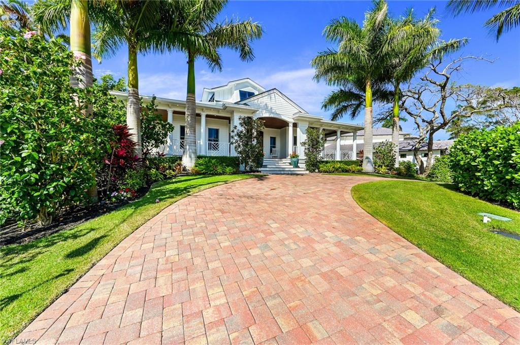 Beautifully remodeled home with Naples/Gulf of Mexico Waterfront Access!  This 3 bedroom with a loft home overlooks a beautiful pool and canal with Western exposure.  Plenty of open space to entertain inside and out. Recently upgraded throughout, including a new roof in the past three years, impact windows and doors, and most recently equipped with solar.  Ample storage in lower level garages.  Minutes to the Gulf of Mexico, Naples pristine beaches, dinning and shopping on 3rd and 5th.