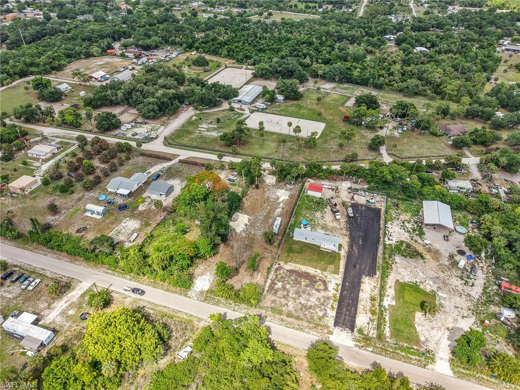 Located in the growing community of North Fort Myers, this oversized .67-acre residential lot presents the perfect opportunity to build your dream home or place a mobile home in a peaceful country-style setting. Situated on a quiet dirt road in the desirable Suncoast Estates neighborhood, this cleared and filled parcel offers endless potential with no HOA fees and flexible MH-3 zoning.
Conveniently located just minutes from shopping, dining, schools, and some of Southwest Florida’s best boating and outdoor recreation, this property combines tranquility with accessibility. With ample space for your home, toys, RVs, boats, or additional structures, the possibilities are endless. Whether you’re looking to build now or invest for the future, this ready-to-go lot is a rare find in a rapidly developing area. Don’t miss your chance to own a spacious slice of Florida living!