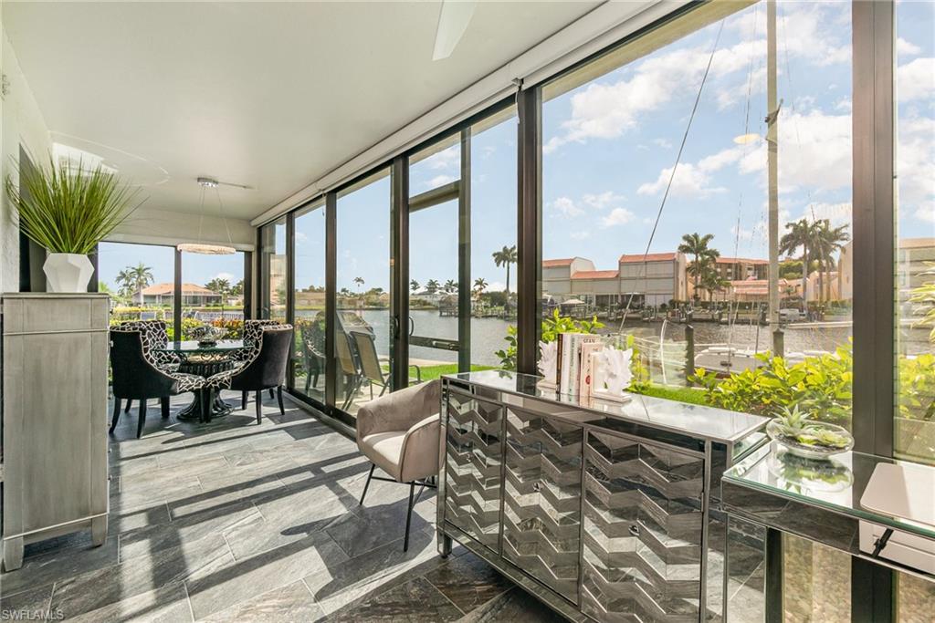 Bonus Opportunity: The owner is a licensed mortgage professional and may be able to offer qualified buyers access to special financing incentives or Friends & Family pricing, subject to eligibility and lender requirements. Call today for details.  Exceptional Waterfront Living with Direct Gulf Access — Dock Space available with board approval! Now Reduced $55,000 Experience elevated coastal living in this beautifully renovated, high-end Gulf-access condo offering the perfect blend of luxury, comfort, and convenience. With a recent $55,000 price reduction, this residence presents an exceptional value and a rare opportunity for buyers seeking a refined waterfront lifestyle. This motivated seller is offering an extraordinary chance to experience luxury, comfort, and direct Gulf-access living in a beautifully updated 3-bedroom, 2-bath end-unit residence with 1,733 square feet of thoughtfully designed living space. The open-concept layout is ideal for both entertaining and everyday relaxation, while the fully renovated interior showcases modern finishes throughout. The chef-inspired kitchen features quartz countertops, under-cabinet lighting, and premium stainless steel appliances. Both bathrooms have been tastefully updated with quartz finishes, while the primary suite offers a spa-like retreat complete with a luxurious roll-in shower. As a desirable end unit, the home is filled with natural light from multiple hurricane-impact windows and sliding doors. The oversized east-facing lanai captures serene waterfront views, creating the perfect setting for morning coffee, quiet evenings, or simply enjoying the Florida lifestyle. Boating enthusiasts will love the direct Gulf access via a 200-foot-wide canal, with just a short three-minute ride to the river. Additional highlights include a newer roof, updated seawall, turnkey convenience, and a community pool located just steps away. Ideally situated near Jaycee Park and close to Publix, dining, shopping, and waterfront recreation, this residence offers an exceptional opportunity to own a beautifully updated Gulf-access condo in a sought-after location. A $5,000 reduction, a motivated seller, and a rare opportunity to experience luxury waterfront living—schedule your private showing today.