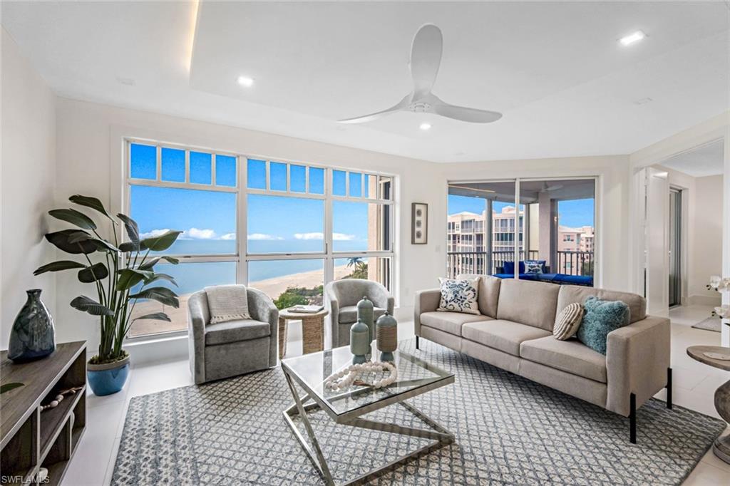 Wow! What a DESIGNER’S SHOWCASE this beautiful condo is!  This direct BEACH FRONT, professionally re-imagined, FURNISHED, 3BR/2BA home overlooking the Gulf of Mexico has it ALL: new in-vogue oversized tile floors, chic modern lighting, luxurious, colorful quartz countertops, elegant faucets, backlit mirrors, and Thermador appliances. The beauty is enhanced by the functionality of the new A/C, water heater, and plumbing system. To top that, revel in your views of the Gulf of Mexico, all the way to Sanibel!  Watch the dolphins, enjoy boats and para sailors, delight in the golden sunsets, and sleep to the sound of the surf!   Spend days walking the beach, searching for shells, taking a swim, sunbathing on the sand, or throwing in a fishing line. Or, go to your beautiful club house to visit with friends poolside, work out at the new state-of-the-art fitness center, or swim laps in the new zero edge pool!  All this located near shopping, casual and fine dining, sports facilities, churches and just 2 exits from RSW airport!  Your new lifestyle is waiting for you in your new condo in exclusive, gated Barefoot Beach.