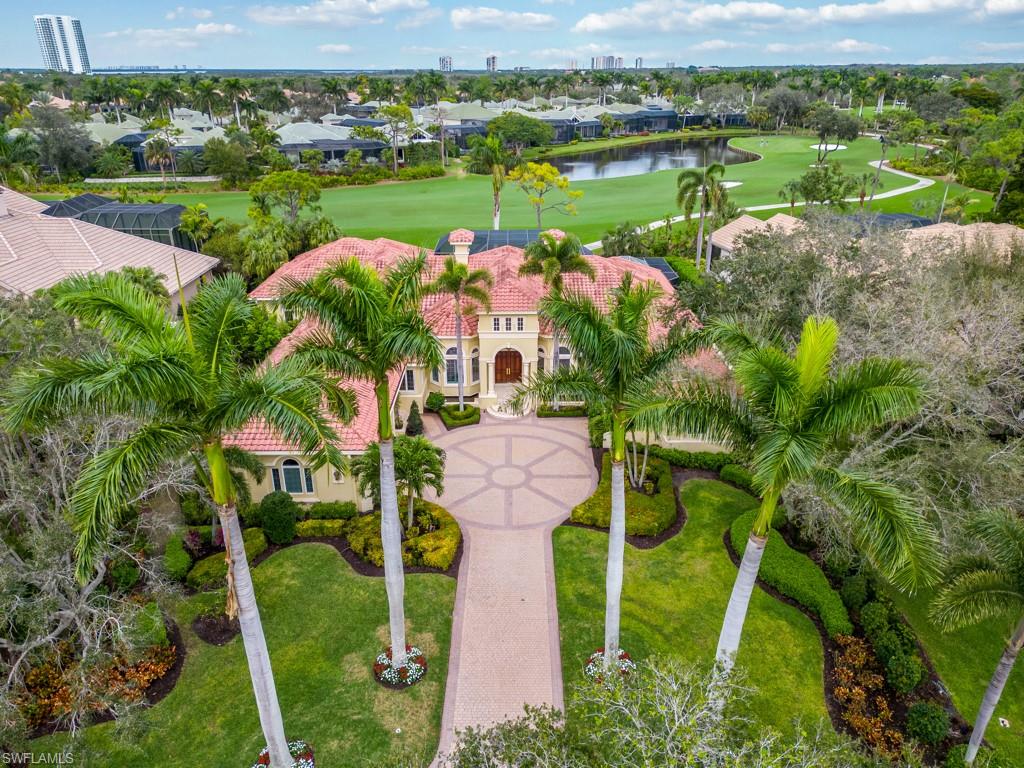 Outstanding 4 Bedroom/5 bath home in most desirable Rookery Lake neighborhood in Bonita Bay! NEW ROOF being installed first quarter of 2024. Gorgeous wide golf and lake views from the oversized and uniquely designed lanai with large vanishing edge pool, separate spa area and wonderful covered seating areas, lovely outdoor kitchen/bar with new grill. The floor plan offers great privacy for the homeowner and their guests, all ensuite. Beautiful kitchen and family room areas with full views of rear exterior, as well as the living room and Master bedroom area. Master bedroom is a lovely set up with his/her closets, vanities, large shower and tub and a private sitting area with a morning kitchen to relax, read and or exercise. Large driveway with 3 car oversized garages, lots of storage and large and bright laundry room, service bar, 2 wine coolers, 2 dishwashers, a wet-bar area off main living spaces, and much more. This home can be purchased with the furniture with a few personal exclusions. Truly a lovely home to enjoy the wonderful lifestyle of Bonita Bay!