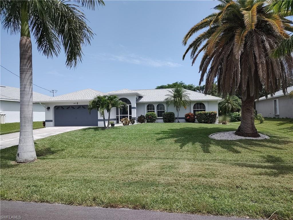 Location! Location! Location!  Don't miss this great 3 Bedroom / 2 Bath Pool Home located in one of the most desirable areas of SW Cape Coral!  Located on a quiet cul-de-sac across from the Shops at Surfside, this home has great mature trees with lush landscaping, French Door entry with screened front entry, planked tile flooring and is perfect for those ready to down-size, use as a rental home, or investment property, or looking for a winter get-away!  The kitchen features updated custom cabinetry, sold surface counter tops, attractive tile backsplash, kitchen nook overlooking the pool and stainless steel appliance package!  Enjoy your evenings in the heated pool, or the under truss lanai, with access to the pool bath! You also have easy access to the Veterans Pkwy. bike and jogging path as well! Peace of mind also come standard with this awesome home with new dimensional shingle roof in 2023, AC new in 2018 and furnishings negotiable too!
