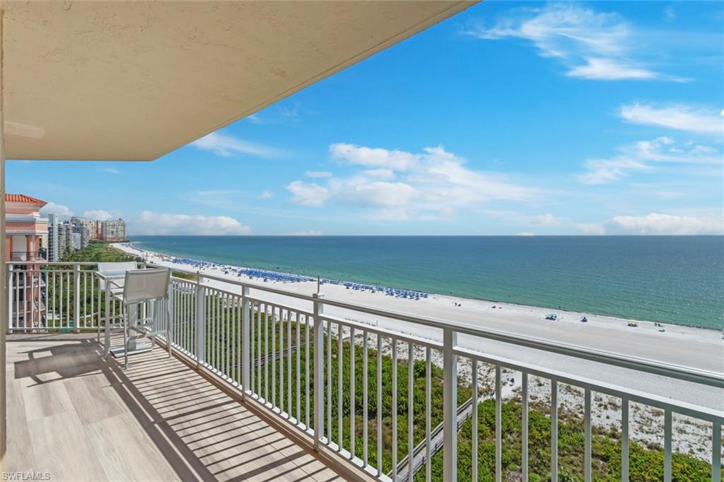RARELY AVAILABLE BEACHFRONT PENTHOUSE - FRONT CONDO with breathtaking, unobstructed panoramic views from Cape Marco to Tigertail Beach. Experience the pinnacle of beachfront living in this spectacular 3-bedroom, 3-bath penthouse. One guest bedroom is en-suite bath. Second bedroom has Murphy Bed. Wake to stunning sunrises over the island and unwind each evening with unforgettable, year-round sunsets painting the turquoise Gulf. Completely reimagined in a top-to-bottom renovation, this exceptional residence was taken down to the studs and rebuilt with all-new electrical, plumbing, and raised ceilings, creating a bright, open, contemporary living space. The designer kitchen features custom cabinetry and tile, elegant lighting, and a spacious breakfast island that seamlessly connects to the living and dining areas—perfect for entertaining. 
Italian wood-grained porcelain tile flows throughout the home and balconies, complemented by impact-resistant windows and sliding glass doors for peace of mind. New A/C system and water heater. 
The expansive wraparound beachfront balcony offers multiple seating areas to relax, dine, and soak in the endless Gulf views, while the guest bedrooms open to their own private balcony. All three bathrooms have been beautifully updated with custom cabinetry and designer tile finishes, completing this truly move-in-ready coastal retreat. Unwind in the spacious pool area, complete with a large spa. For dinner, grill up some delicious food at the BBQ bar area and entertain your guests. Alternatively, take a stroll to the beach and enjoy a refreshing swim in the beautiful Gulf. For convenience, rent chairs and umbrellas from the vendor next door! Enjoy a game of tennis or pickle ball. The Chalet has 2 Guest Suites for overflow!
The Chalet is just finishing up a complete renovation which includes a new roof, new elevators and beautiful new hallways.  The building has undergone a massive concrete restoration, painting and new balcony railing installation project. The fitness room has been updated with all new equipment. The entrance has been refreshed with new furniture.  The library has been converted to a private meeting room-in person/zoom.  The social room is being refurbished, flood panels installed at each entrance, boardwalk rebuilt, sewer pipes relined, new boilers installed and cooling tower restored. All work has been paid for by the Seller! 
The Chalet enjoys a prime central location near the JW Marriott and Hilton, placing you within easy walking distance of Marco Island's premier dining, shopping, and entertainment. Stroll to some of the island's most popular restaurants, including Sale e Pepe, DaVinci, The Oyster Society, Marco Prime, Nacho Mama's, The Salty Dog, Fin Bistro, and La Tavola, and experience the best of the island right outside your door. Extra-large storage room in hallway plus additional storage on first floor. 24-hour security by Butterfly MX System. Chalet allows one pet-20 pounds!
