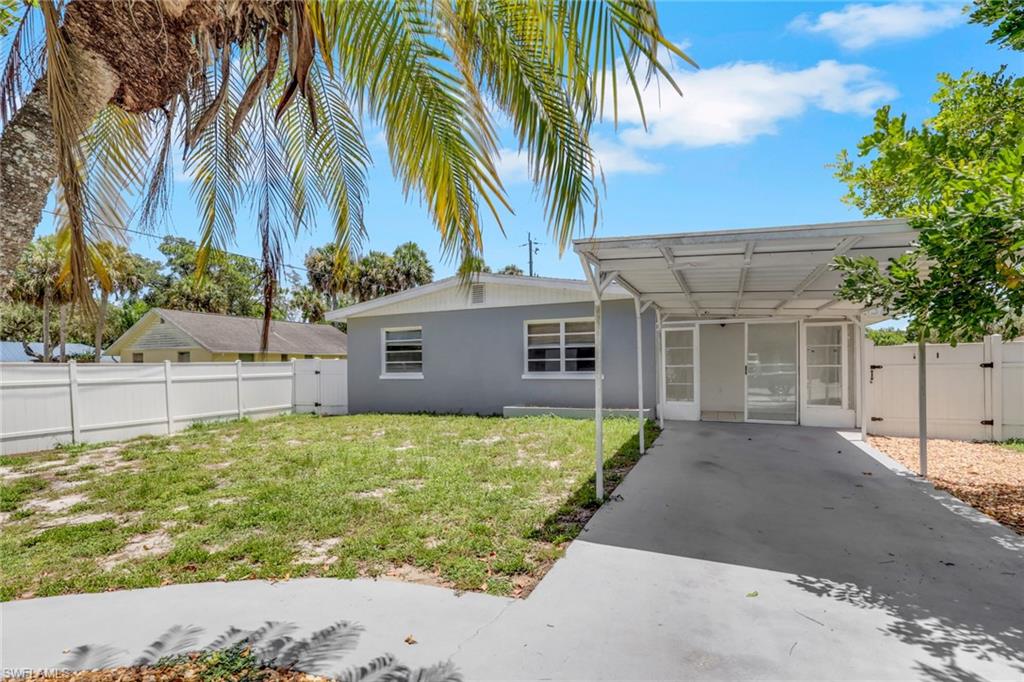 Discover the charm of Bonita Springs in this beautifully single-family home, ideally situated at the end of a quiet street in an established neighborhood. Offering the perfect blend of privacy, comfort, and convenience, this property is just minutes from the Gulf beaches, I-75, and the vibrant downtown Bonita Springs area.
The thoughtfully designed split-bedroom floor plan features 2 bedrooms plus a versatile den, 1 bathroom, and an inviting Great Room concept that maximizes both space and functionality, Detached car garage and fenced for privacy. Stylish laminate flooring throughout some tile, and a beautifully refreshed kitchen highlighted by a vibrant backsplash that adds warmth and character.
Whether you’re searching for a full-time residence, seasonal retreat, or investment opportunity, this home delivers the relaxed Southwest Florida lifestyle you’ve been looking for. Enjoy easy access to some of the area’s most popular destinations, including Barefoot Beach, Doc’s Beach House, Mercato, Wiggins Pass State Park, and Koreshan State Park all within a short drive. The attached two-car carport provides ample covered parking and additional space for guests. Experience the beauty of Bonita Springs while enjoying a quieter lifestyle with convenient access to everything Southwest Florida has to offer.
