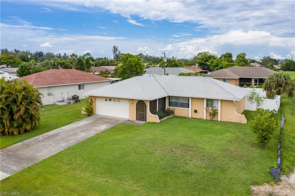 Here is your chance for a pool home for under $200K! A beautifully updated kitchen welcomes you when you walk in the door, then your eyes are drawn out to the above ground pool and fully fenced in yard. This neighborhood in SW Cape Coral is close to shopping, restaurants, and entertainment.  Make it your own with the few updates that still need to be done.