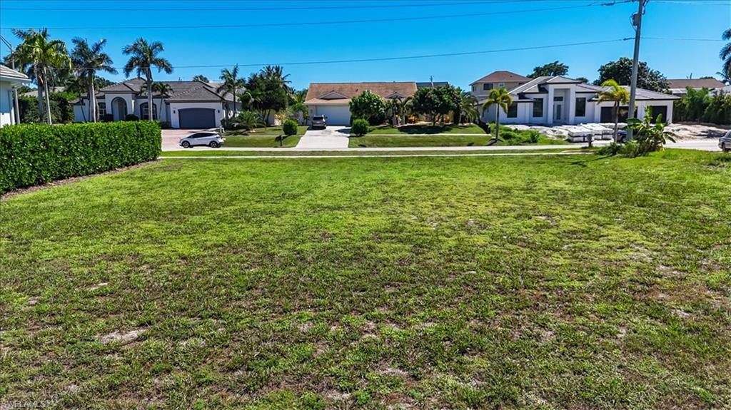 Build your dream home in the heart of Marco Island on this .25 acre direct access (no bridges) homebuilder site with 100 feet of canal water front and a NEW SEAWALL installed in 2019.
