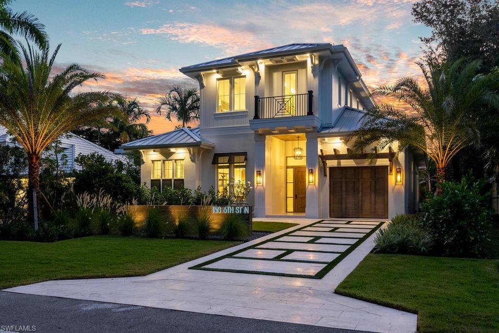 Steps away from Naples’ renowned sugar sand beaches, this coastal contemporary and elegant new construction home by Kaye Lifestyle Homes can be yours today! Just completed, it features an open yet formal concept with wide plank Legno Bastone floors, whole house generator, custom kitchen, exquisite custom trim, and ceiling detail. The floor plan is designed for Florida living, with an oversized first-floor master suite featuring 3 walk-in closets and a luxuriously-finished master bath, with tub, dual sinks, and an oversized mother-of-pearl-lined shower. There's a generous study with a large private bath. Upstairs, there’s a second master bedroom with a loft and balcony overlooking the tropical pool and spa, and 2 more guest bedrooms with a generous and luxuriously-finished bath. The pool area exudes tropical ambiance, with outdoor kitchen and seating area and gas fireplace surrounded by lush landscaping. On one of the most beautiful streets in Old Naples, this home offers a 2-car garage off alley, and another one-car garage at the front! And it's just minutes from the cultural district of "Fifth Avenue South." This is coastal elegance by Kaye Lifestyle Homes. Make it yours today!