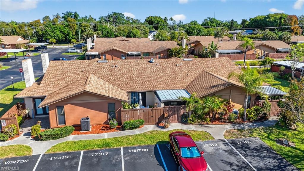 So close to everything and just steps away from the amazing Royal Woods amenities including resort pool, spa, clubhouse, lighted tennis & pickleball courts and is pet friendly! Some of the fine features of this three-bedroom villa home include a modern open plan, an updated kitchen with ample custom cabinetry, stainless appliances, quartz countertops and high-volume exhaust fan. Two amazing covered and screened lanais for additional living space. Vaulted ceilings, tile flooring throughout, six panel & French doors. Private owner's suite with updated ensuite bath, walk in closet and state of the art steam shower. The association maintains the roof, exterior painting & siding for very reasonable dues of only $291 a month! This sunny and bright villa is located on a corner lot with dedicated parking and minutes away from FGCU, I75, RSW Airport, Shopping. Restaurants, Lakes Park And The Award Winning Beaches Of Southwest Florida! Live the Florida lifestyle at it's best!