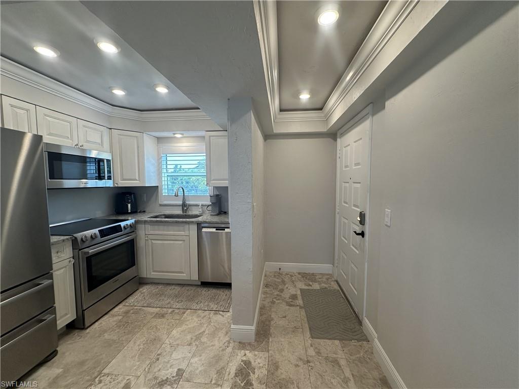 Beautifully updated CORNER 2BR/2BA condo at Estero Cove! This bright unit lives large for its footprint, with natural light pouring in from multiple exposures thanks to its corner position. The kitchen, bathrooms, flooring, and bedrooms have all been updated, giving the home a fresh, move-in-ready feel. Impact-resistant windows throughout offer peace of mind, energy efficiency, and sound insulation, so no shutters are needed for storm season. The home is available turnkey furnished or unfurnished, giving buyers flexibility to move right in or make it their own. Amenities at Estero Cove include a community pool, tennis & pickleball courts, bocce court, shuffleboard court, and a nature trail with fishing bridges and an Estero Bay fishing pier. Boating enthusiasts will love the nearby marina offering boat rentals and dry stack storage, giving easy access to the Gulf of America or Estero Bay's popular north-end restaurants and bars. Nature lovers will appreciate being just minutes from Lover's Key State Park, with its pristine beaches, kayaking, and wildlife trails. Whether you're looking for a full-time residence, seasonal getaway, or an income-producing rental, this condo is ready to fit your lifestyle, with no waiting period required before leasing. Shopping, dining, and entertainment are just minutes away, with easy access to Bonita Springs and Naples. Schedule your private showing today!