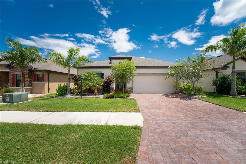 Beautiful 2017 Maronda Miramar Model 4 bedroom home available in Villa Milano. This well-maintained home is over 2100+ square feet under air and is loaded with upgrades. From the moment you walk through the plated glass entry door you will love the tray ceilings in the grand entry and the 9'4" ceilings with crown molding. To the left you will find your guest quarters with two bedrooms and a bath. Further into the home on the right you will find a 4th bedroom which can also be used as a very private office or hobby room. Located in the back of the home this very popular floorplan opens to the gorgeous great room designed with entertaining in mind. Here you will also find the GOURMET KITCHEN including the much-loved DOUBLE OVENS and 9 foot center island. 42" white cabinets with crown molding and plenty of counter space. Large TRIPLE SLIDERS lead out to the big lanai that overlooks the oversized FENCED backyard where there is room to add a pool. Also at the back of the home is the master bedroom with tray ceiling and a massive walk-in closet. This home comes equipped with outdoor lighting, hurricane shutters, irrigation, paver driveway and walkway, and is nicely landscaped.