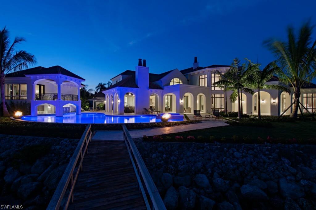Just Completed! The Captain's Reserve. Boasting the most idyllic setting in all of Port Royal with unobstructed, wide-water, views and preferred southern exposure this Alan Fraser Homes Corp. masterpiece. With classic Palm Beach infused architecture by Jeffrey A. Harrell Architects, the quality craftsmanship of BCB Homes and exquisitely appointed and furnished by Godfrey Design Consultants, Inc., this stunning estate is destined to raise the bar on Port Royal excellence. Complemented by a separate guest house that seems to ascend from the resort-style pool, this unique property offers attributes and vistas that others simply cannot provide.